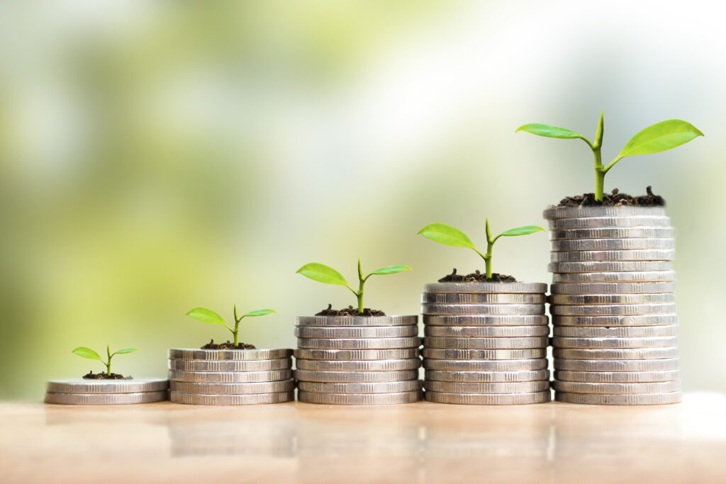 Save money with stack coin. Growing your business concept. Young Verduurzaming